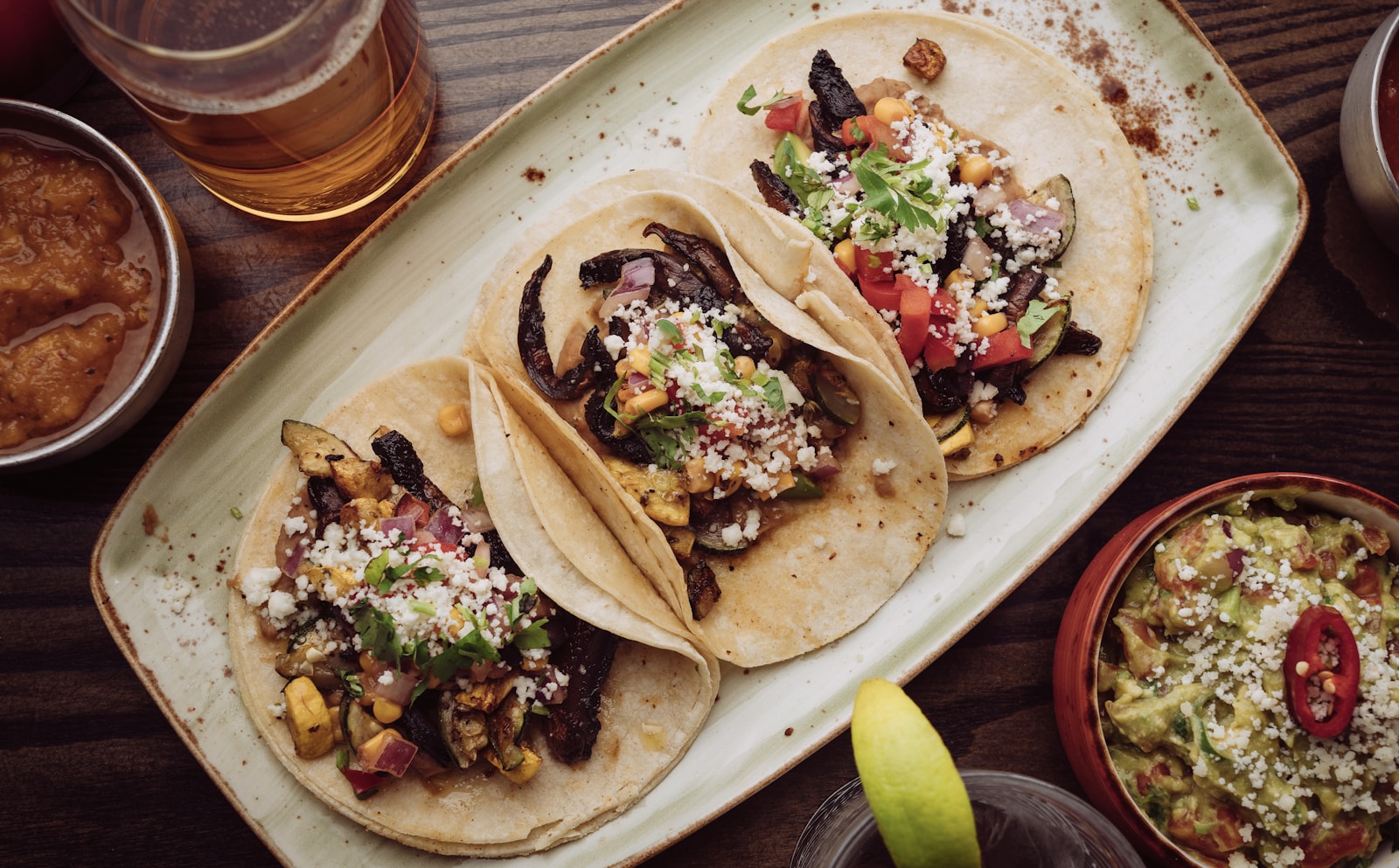 loaded tacos on a platter.